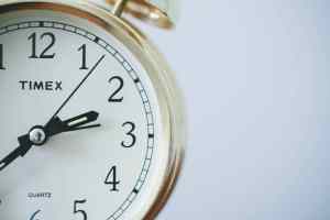 Close-up of a clock face symbolizing time, focus, and resilience